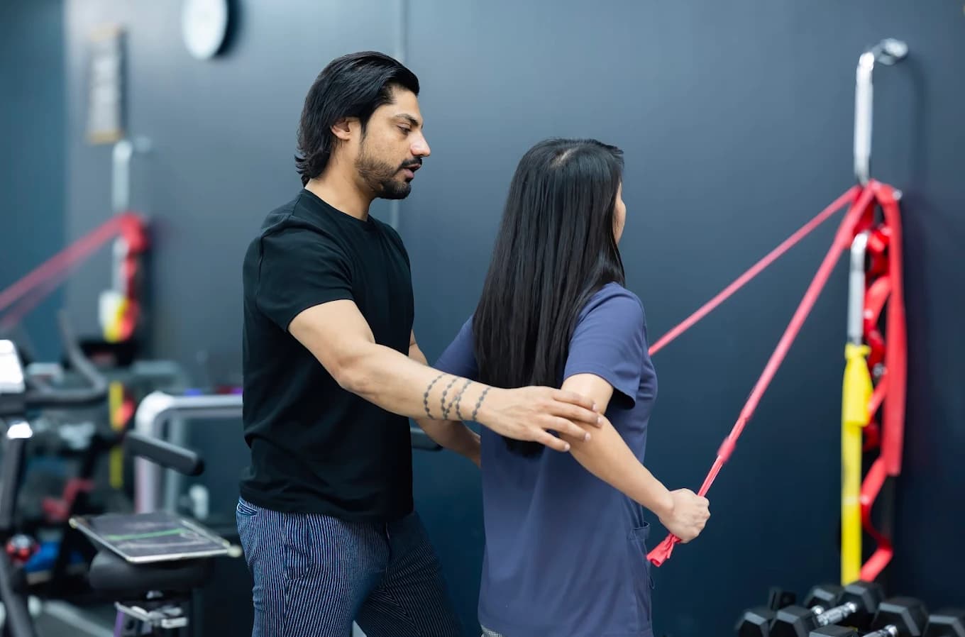 Physiotherapist guiding a patient through a rehabilitation exercise in Calgary